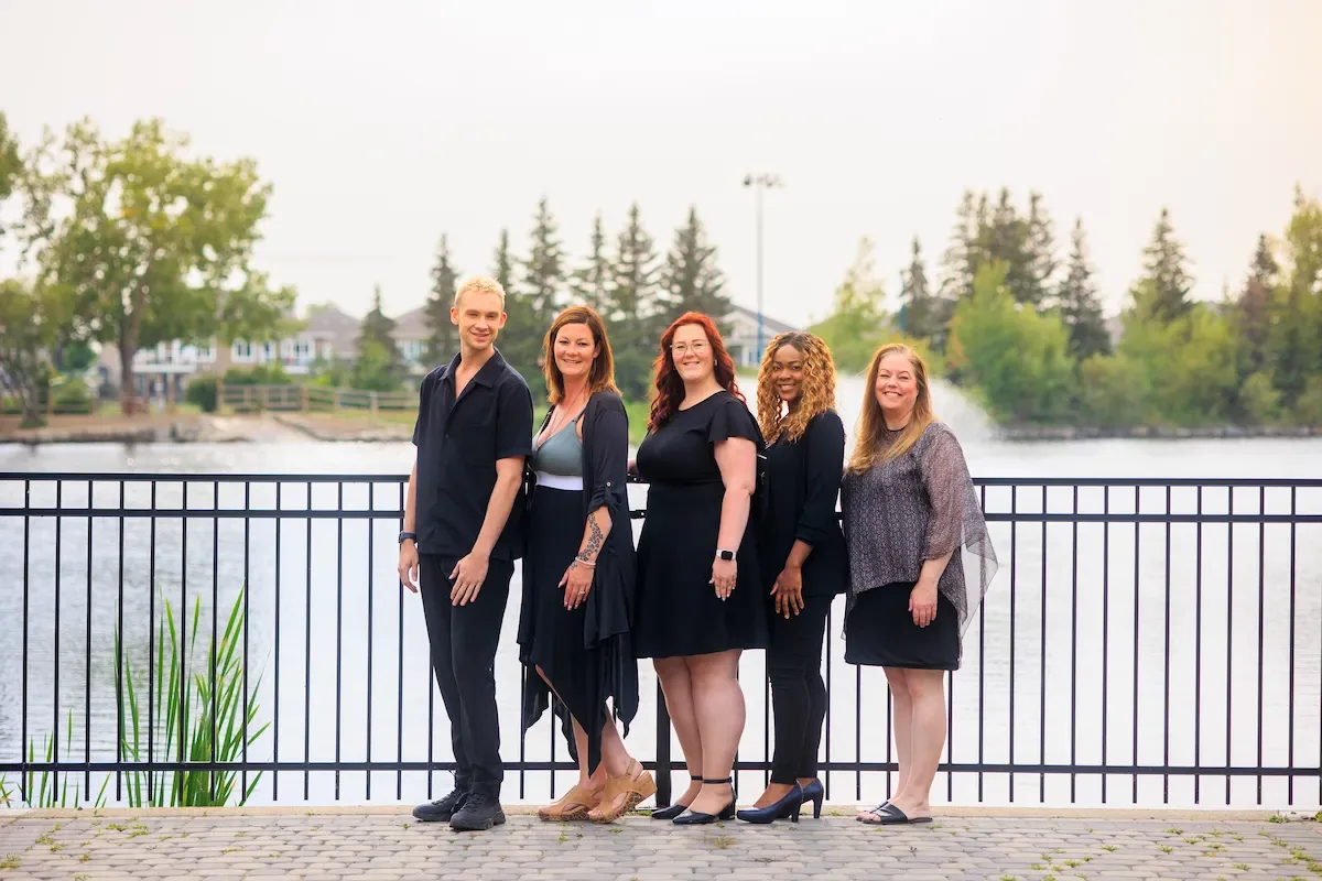 Ashley Moore Century 21 team golden hour portrait by the lake