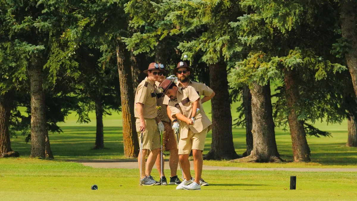 Golf team in matching costumes on the course