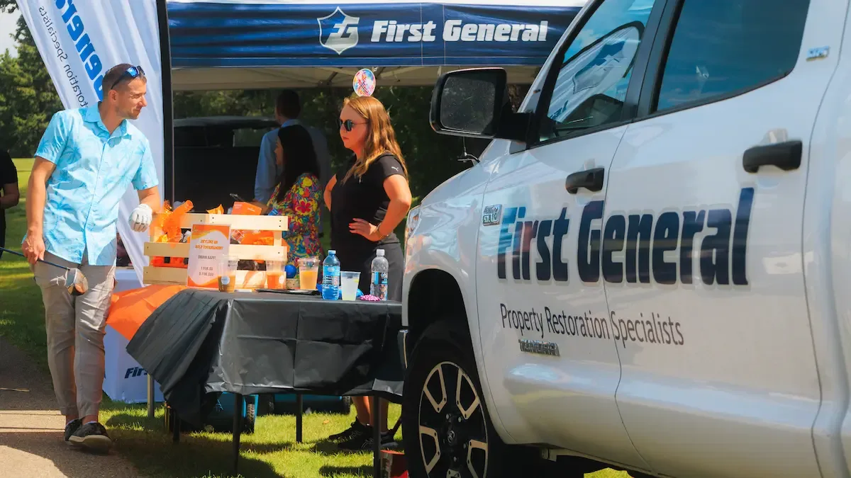 First General Property Restoration sponsor booth