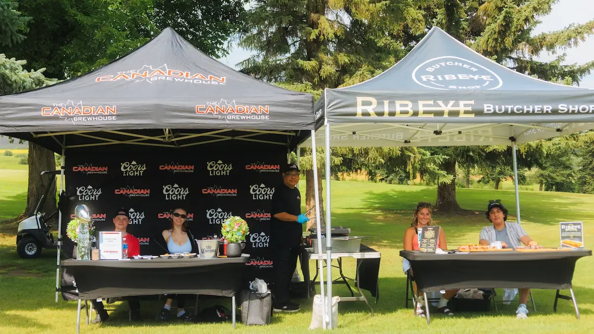 Canadian Brewhouse and Ribeye Butcher Shop sponsor tents